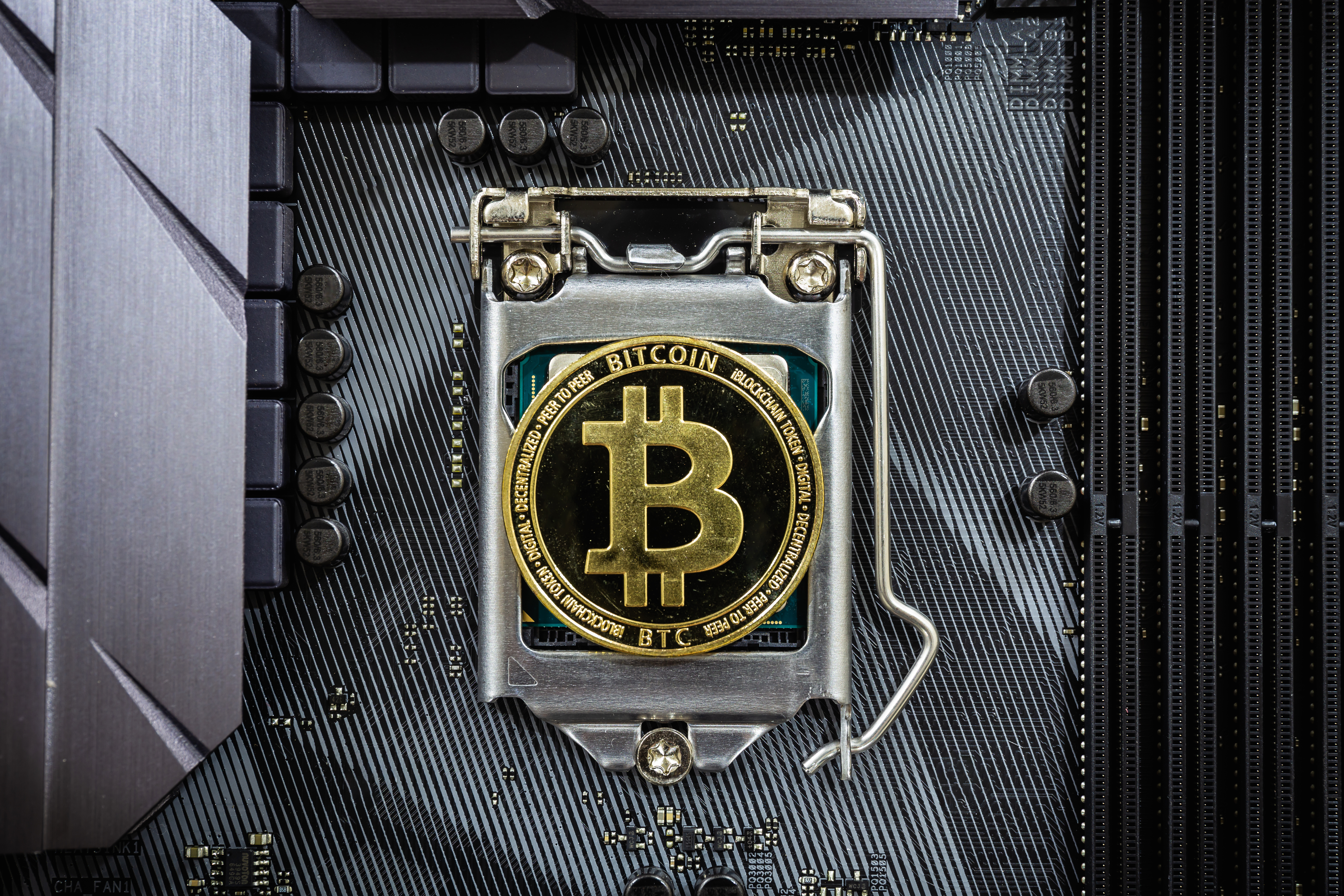 Gold bitcoin metallic background.jpg