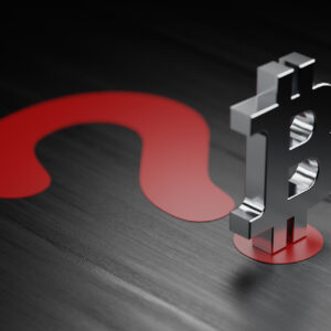 Bitcoin symbol on red question mark.jpg