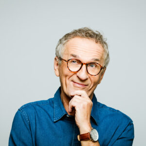 Hand on chin thinking considering smiling.jpg