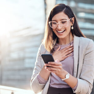 Looking surprised while using her cellphone.jpg