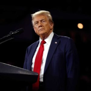 An20image20of20donald20trump20standing20in20front20of20a20podium 20image20by20anna20mo.jpeg