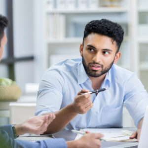 Two investors meet and discuss.jpg