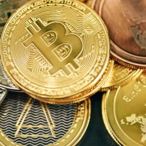 A pile of gold and silver bitcoins.jpg