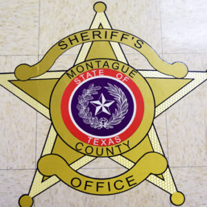 Sheriffs badge on floor.jpg