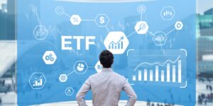 Urlhttps3A2F2Fg.foolcdn.com2Feditorial2Fimages2F8871822Fperson at board that says etf 1.jpg