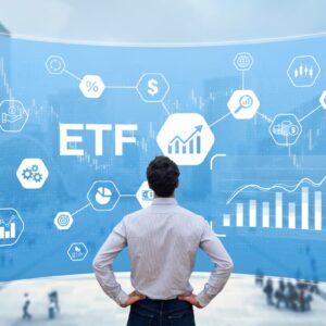 Urlhttps3A2F2Fg.foolcdn.com2Feditorial2Fimages2F8871822Fperson at board that says etf 1.jpg